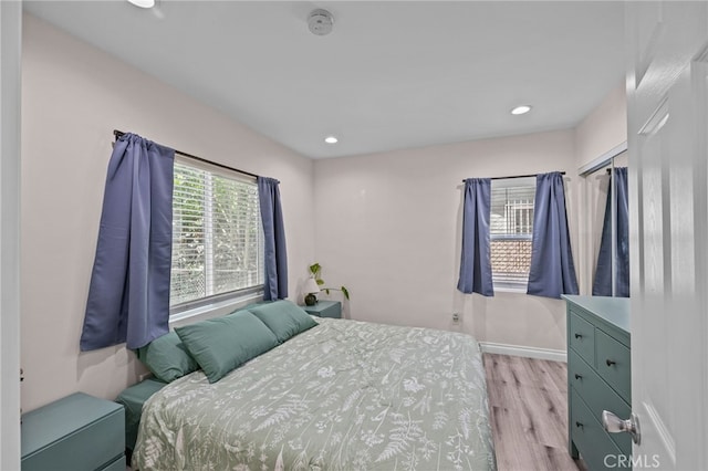 156 W Wabash St, San Bernardino, CA 92405 - bedroom featuring light wood finished floors and recessed lighting