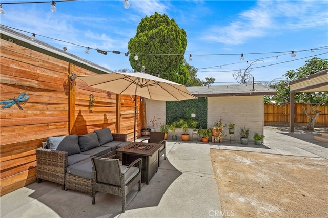 156 W Wabash St, San Bernardino, CA 92405 - view of patio with an outdoor living space with a fire pit