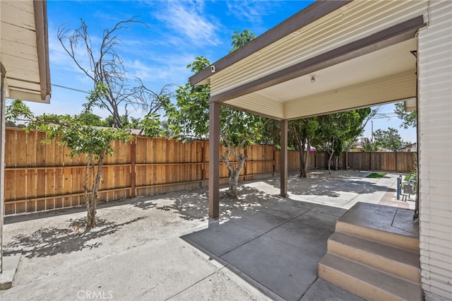 156 W Wabash St, San Bernardino, CA 92405 - fenced backyard with a patio