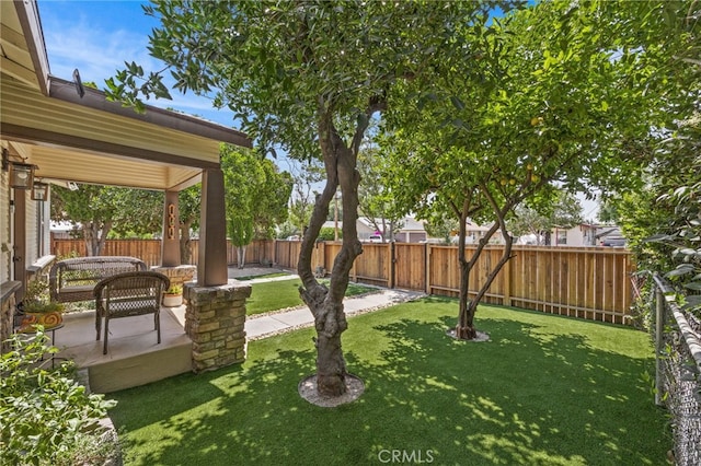 156 W Wabash St, San Bernardino, CA 92405 - fenced backyard with a patio