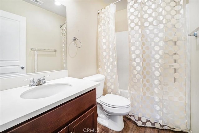 29234 St Andrews, Lake Elsinore, CA 92530 - full bath with vanity, shower / tub combo, and wood finished floors