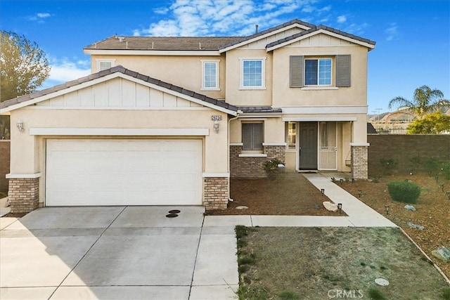 29234 St Andrews, Lake Elsinore, CA 92530 - view of front of house with stucco siding, concrete driveway, brick siding, and a garage