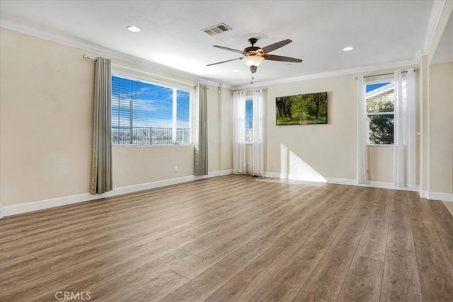 29234 St Andrews, Lake Elsinore, CA 92530 - unfurnished room with crown molding, ceiling fan, wood finished floors, healthy amount of natural light, and recessed lighting
