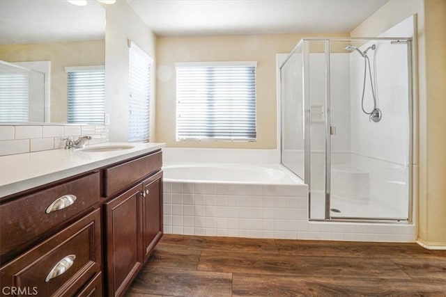 29234 St Andrews, Lake Elsinore, CA 92530 - full bathroom featuring a stall shower, wood finished floors, and vanity