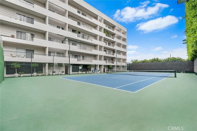 1131 Alta Loma Rd Unit 207, West Hollywood, CA 90069 - view of tennis court featuring community basketball court