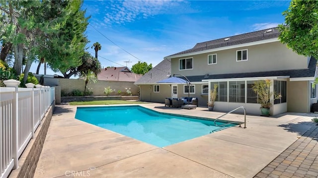 2867 N Shady Glen Ln, Orange, CA 92867 - view of pool featuring a patio, a fenced backyard, an outdoor hangout area, and a sunroom