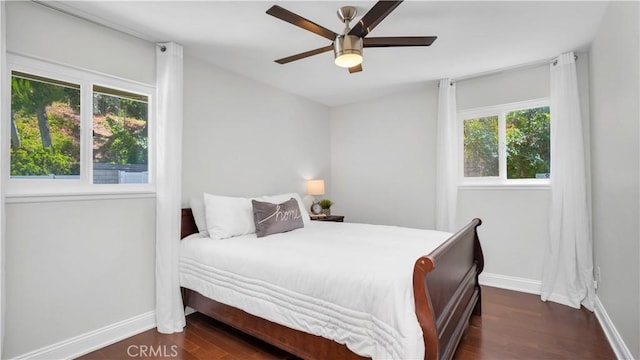 2867 N Shady Glen Ln, Orange, CA 92867 - bedroom with multiple windows, dark wood finished floors, and a ceiling fan
