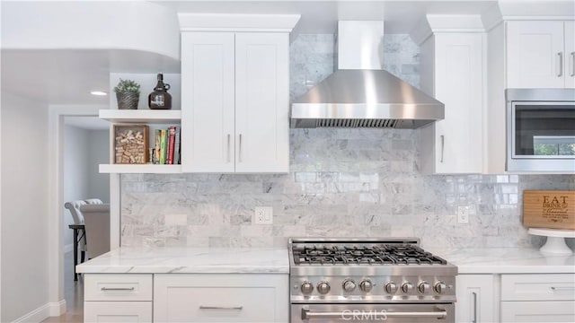 2867 N Shady Glen Ln, Orange, CA 92867 - kitchen featuring stainless steel appliances, wall chimney exhaust hood, open shelves, white cabinetry, and light stone counters