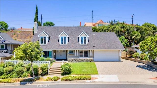 2867 N Shady Glen Ln, Orange, CA 92867 - new england style home with decorative driveway, a garage, and a front yard
