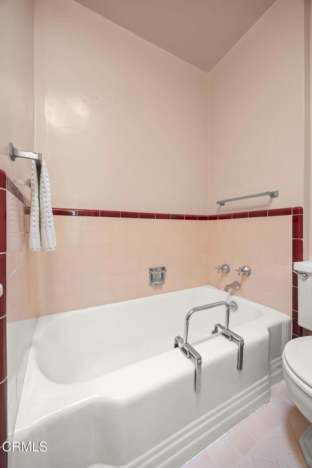 1613 Muir St, Fillmore, CA 93015 - bathroom featuring a bath, tile patterned flooring, and pet washing station