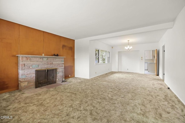 1613 Muir St, Fillmore, CA 93015 - unfurnished living room with a chandelier, a stone fireplace, and carpet flooring