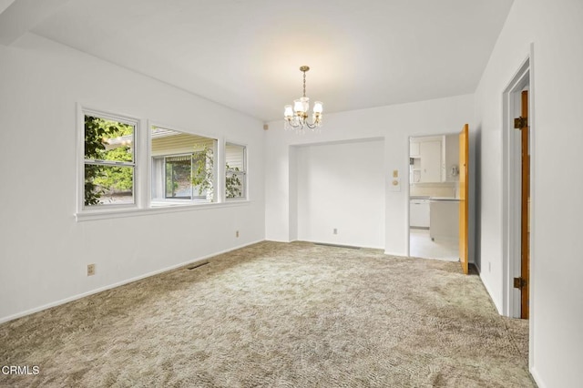 1613 Muir St, Fillmore, CA 93015 - spare room with carpet and a chandelier