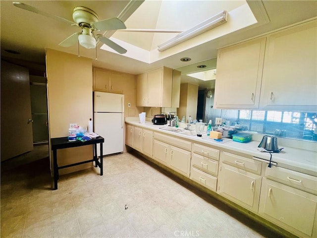 13240 El Dorado Dr Unit 187I, Seal Beach, CA 90740 - kitchen with freestanding refrigerator, light countertops, and ceiling fan