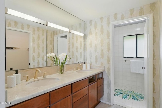 3121 Kingridge Way, Glendale, CA 91206 - full bathroom with wallpapered walls, double vanity, and a tile shower