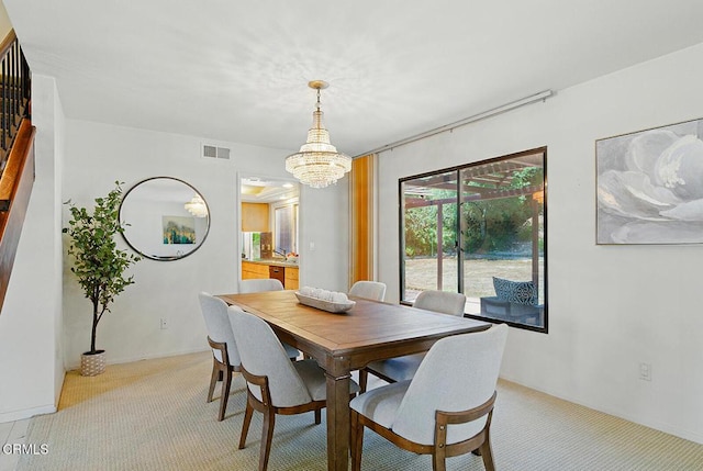 3121 Kingridge Way, Glendale, CA 91206 - dining room with light colored carpet and a chandelier