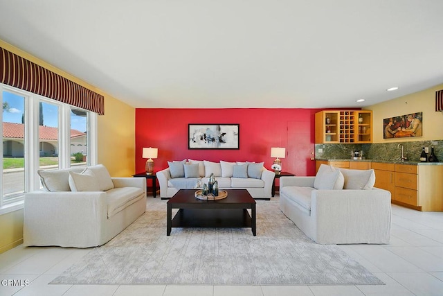 3121 Kingridge Way, Glendale, CA 91206 - living room with bar area, light tile patterned floors, an accent wall, and recessed lighting