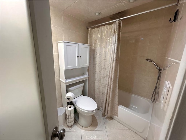 28004 Western Ave S Unit 121, San Pedro, CA 90732 - full bath featuring shower / bathtub combination with curtain, tile patterned flooring, and tile walls
