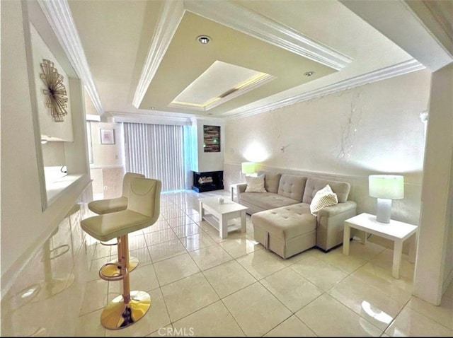 28004 Western Ave S Unit 121, San Pedro, CA 90732 - living area with ornamental molding, a tray ceiling, and light tile patterned floors