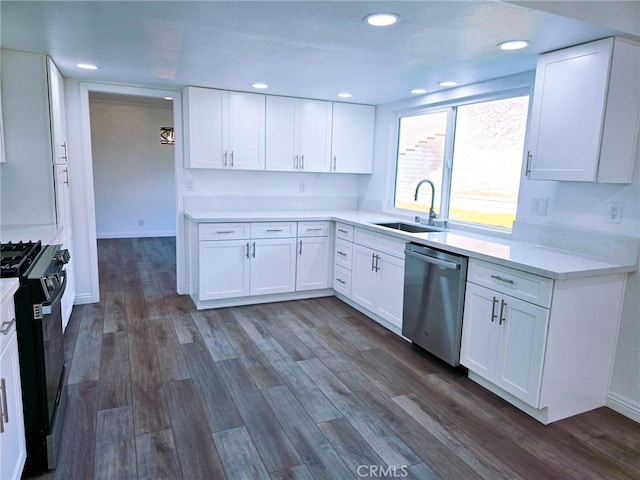 10672 Finch Ave, Rancho Cucamonga, CA 91737 - kitchen with black stove, dishwasher, light countertops, white cabinets, and recessed lighting