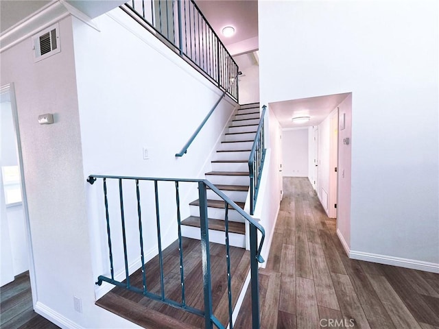 10672 Finch Ave, Rancho Cucamonga, CA 91737 - staircase with wood finished floors