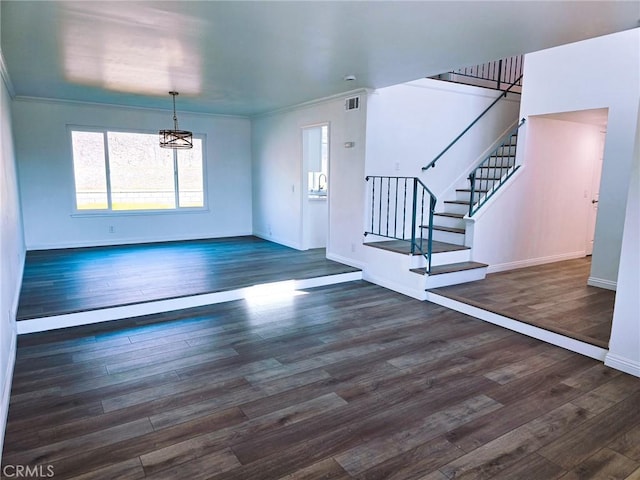 10672 Finch Ave, Rancho Cucamonga, CA 91737 - entrance foyer with a chandelier, stairs, wood finished floors, and ornamental molding