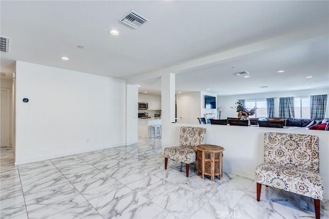 28420 Abbey Ln, Menifee, CA 92585 - living room with recessed lighting and light marble finish floors