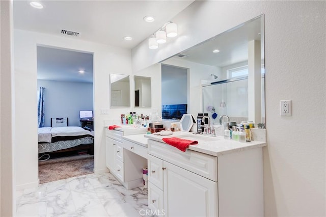 28420 Abbey Ln, Menifee, CA 92585 - ensuite bathroom with a stall shower, vanity, marble look tiles, and recessed lighting
