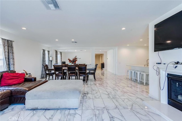 28420 Abbey Ln, Menifee, CA 92585 - living area with light marble finish flooring and recessed lighting