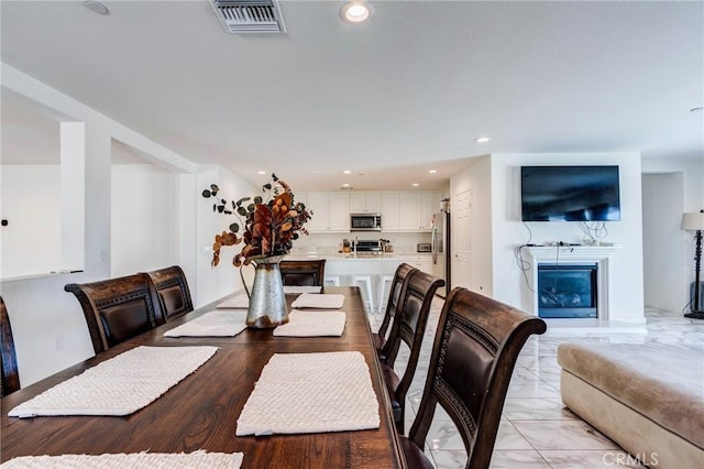 28420 Abbey Ln, Menifee, CA 92585 - dining room with a fireplace and recessed lighting