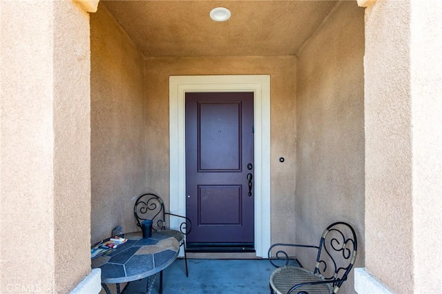 28420 Abbey Ln, Menifee, CA 92585 - entrance to property with stucco siding