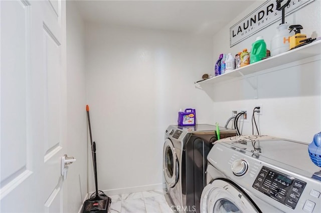 28420 Abbey Ln, Menifee, CA 92585 - laundry room featuring washing machine and clothes dryer and light marble finish flooring