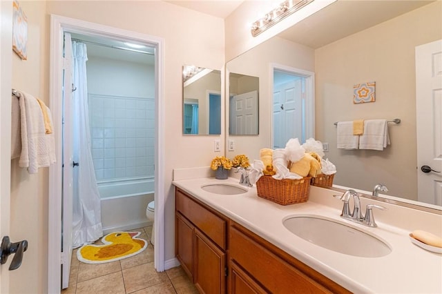 3867 Taconite Rd, San Bernardino, CA 92407 - full bath with double vanity, tile patterned flooring, and shower / bath combo with shower curtain