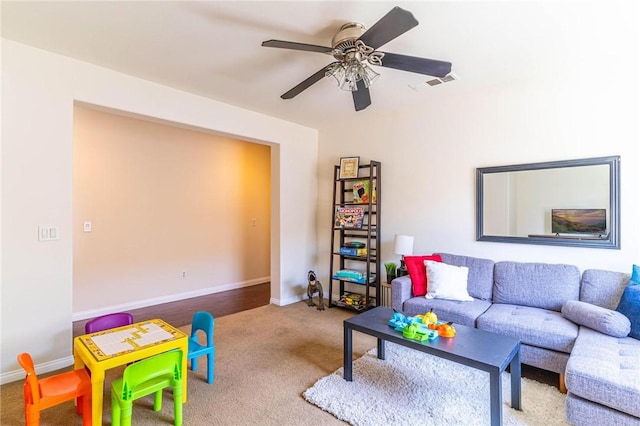 3867 Taconite Rd, San Bernardino, CA 92407 - living area featuring carpet and a ceiling fan