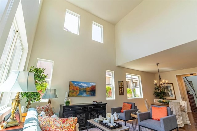 3867 Taconite Rd, San Bernardino, CA 92407 - living room with a chandelier, wood finished floors, and a high ceiling
