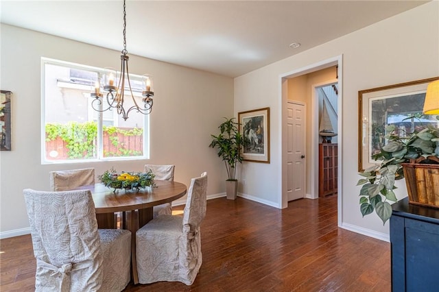 3867 Taconite Rd, San Bernardino, CA 92407 - dining space with wood finished floors and a chandelier