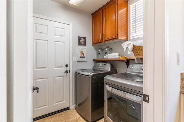3867 Taconite Rd, San Bernardino, CA 92407 - washroom with cabinet space, washer and dryer, and light tile patterned floors