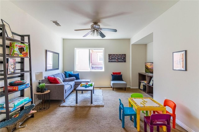 3867 Taconite Rd, San Bernardino, CA 92407 - carpeted living area with ceiling fan and baseboards