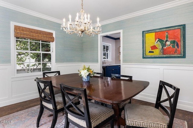 232 Glen Summer Rd, Pasadena, CA 91105 - dining space featuring a chandelier, dark wood finished floors, wainscoting, wallpapered walls, and ornamental molding