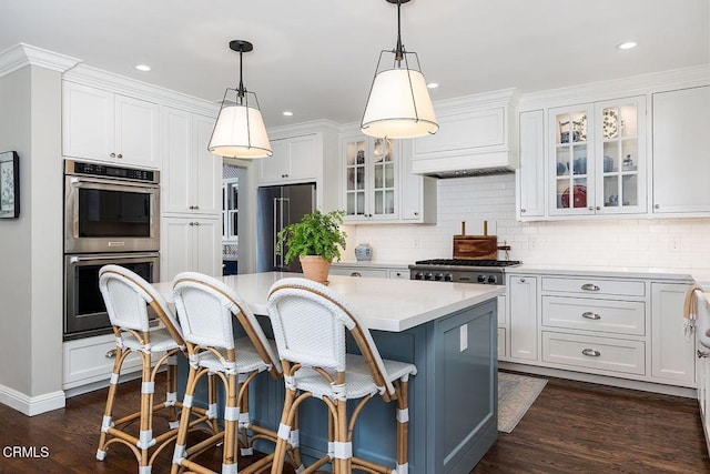 232 Glen Summer Rd, Pasadena, CA 91105 - kitchen featuring stainless steel appliances, custom range hood, white cabinetry, light countertops, and recessed lighting