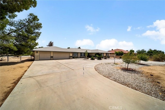 18969 Shoshonee Rd, Apple Valley, CA 92307 - ranch-style house featuring an attached garage and concrete driveway