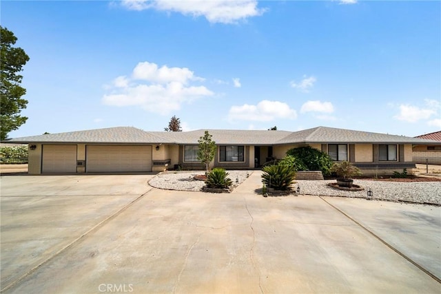 18969 Shoshonee Rd, Apple Valley, CA 92307 - single story home with an attached garage, driveway, and stucco siding