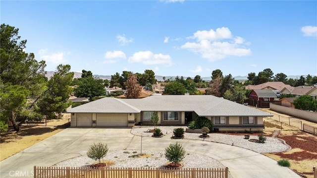 18969 Shoshonee Rd, Apple Valley, CA 92307 - ranch-style home with curved driveway and a garage