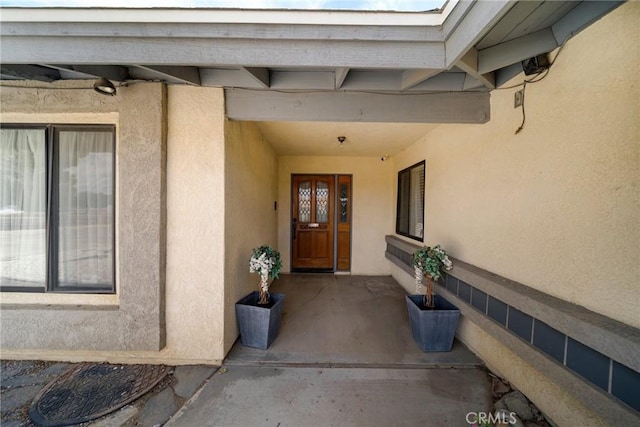 18969 Shoshonee Rd, Apple Valley, CA 92307 - doorway to property featuring stucco siding