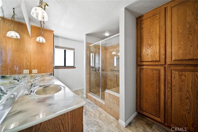 18969 Shoshonee Rd, Apple Valley, CA 92307 - full bathroom with a stall shower, double vanity, and a textured ceiling