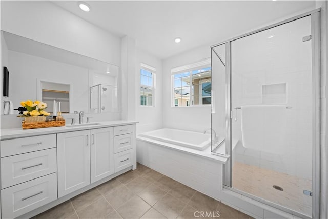 1042 N Anaheim Blvd Unit 2, Anaheim, CA 92801 - full bathroom featuring vanity, a shower stall, a garden tub, tile patterned flooring, and recessed lighting