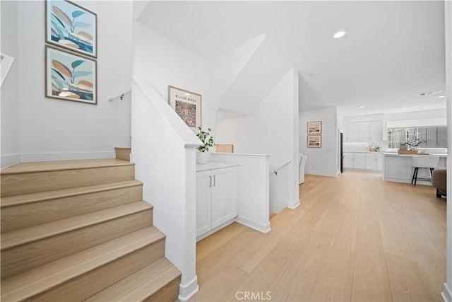 1042 N Anaheim Blvd Unit 2, Anaheim, CA 92801 - corridor with light wood finished floors, recessed lighting, and stairway