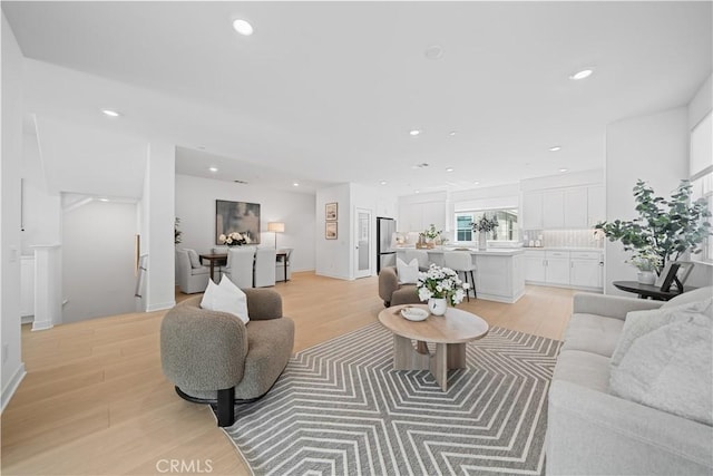 1042 N Anaheim Blvd Unit 2, Anaheim, CA 92801 - living room with light wood-style floors and recessed lighting