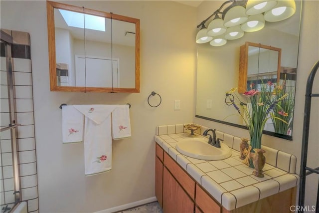 3376 Hackamore Ln, Chico, CA 95973 - bathroom featuring vanity and a skylight