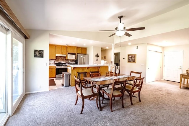 3376 Hackamore Ln, Chico, CA 95973 - dining room featuring light colored carpet, healthy amount of natural light, ceiling fan, recessed lighting, and lofted ceiling