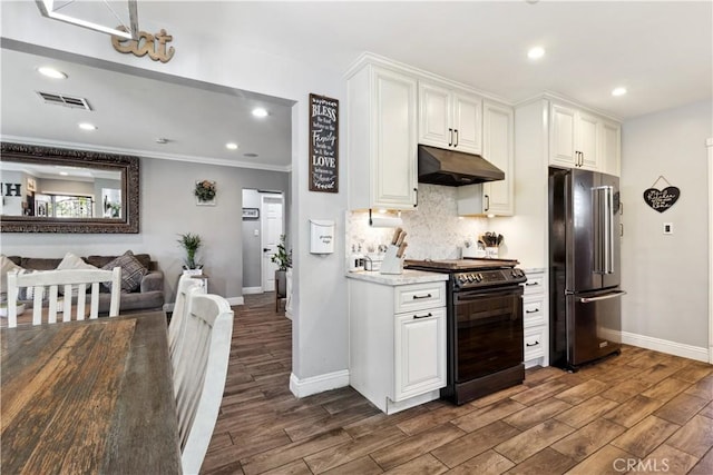 340 N Sunset Ave, West Covina, CA 91790 - kitchen with high quality fridge, electric stove, under cabinet range hood, wood tiled floors, and backsplash